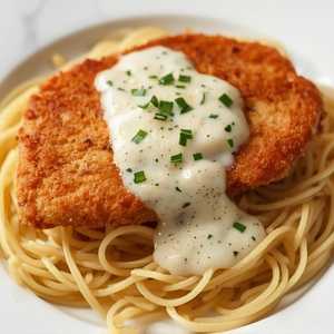 Pan-Fried Chicken in Cream Sauce over Spaghetti or Rice