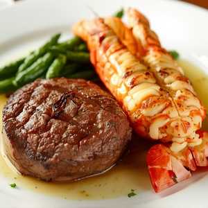 Seared Tenderloin with Butter Poached Lobster Tails