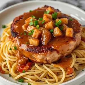 Pork Chop with Onions over Spaghetti or Rice