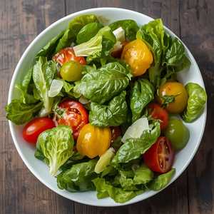 Field Greens, Butter Leaf Lettuce, Heirloom Tomatoes with Parmesan Vinaigrette