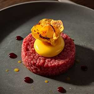 Beef Tartare with Caesar Crémeux, Egg Yolk Mousse, and Parmesan Lavash