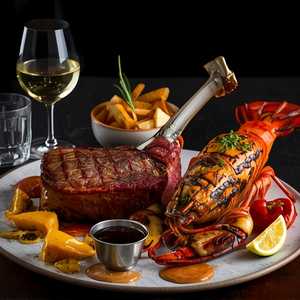 Tomahawk Ribeye & Lobster Tail