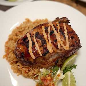 poulet rouge, peach salsa, carolina gold rice, cabbage, guajillo, jalapeño crema
