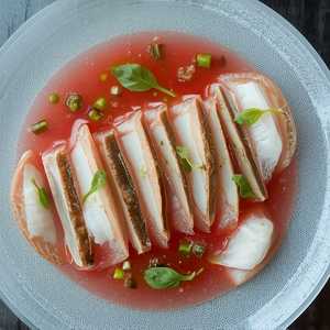 fluke crudo, watermelon aguachile, tomato, tomatillo, basil, chile oil