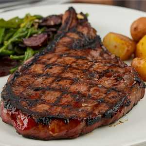Grilled 18-ounce Stemple Creek Ranch ribeye steak (served with the above accompaniments)