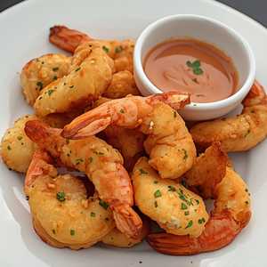 Crispy Seafood Bites / Chicharrón de Pescado o Camarón