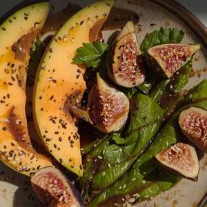 Full Belly Farm melons with panache figs, Padrón peppers a la plancha, sesame yogurt, cilantro, and mole seco