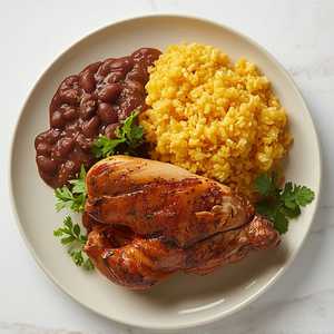 Arroz Guisado, Habichuelas, y 1/2 Pollo Asado