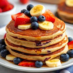 Stack of Double Berry Banana Strawberry Pancakes