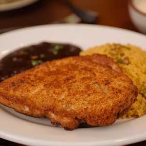 Chuleta De Puerco Empanisada
