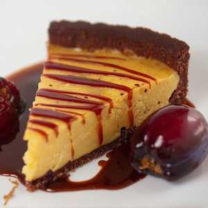 butterscotch tart, rye crust, roasted plums, mocha-caramel sauce