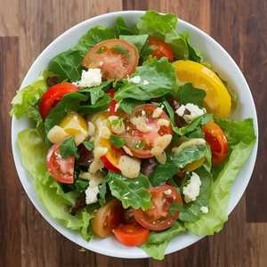 Field Greens, Butter Leaf Lettuce, Heirloom Tomatoes with Parmesan Vinaigrette