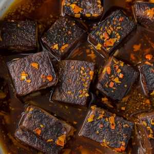 Elephant yam cake simmered w/ minced hot pepper