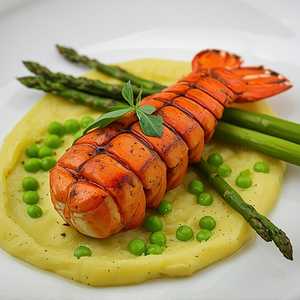 Roast Lobster with Potato Purée, Edamame, Peas, Asparagus, and Tarragon