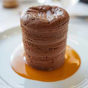 Baked Chocolate Soufflé with Two Sauces