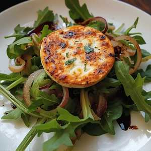 Warm goat cheese, arugula, cipollini onions, balsamic vinaigrette