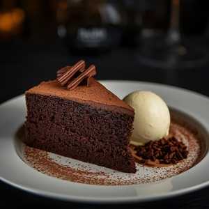 Café Amaro Chocolate Torte With Crème Fraiche Gelato & Cocoa Nibs
