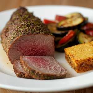 Herb Crusted Lamb Loin with Eggplant Zucchini Tian, and Crispy Polenta