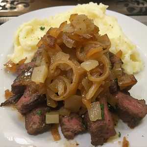 Prime Sirloin Chopped Steak* With Caramelized Onions, Cheddar Cheese And Mashed Potatoes