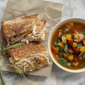 Signature sandwich and half salad or bowl of soup