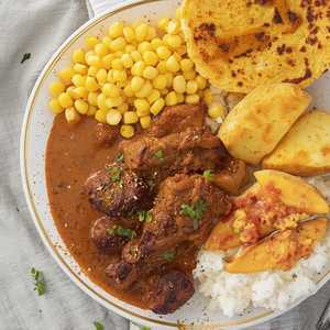 Caribbean Curry Goat & Turmeric Flatbread