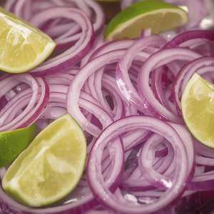 Onion Slices with Lime Wedge